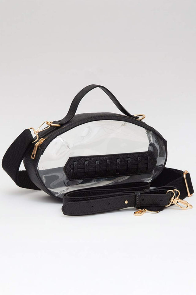 Black Carry your essentials in style with this unique football-shaped transparent crossbody bag. Perfect for stadium events, concerts, and outdoor gatherings, the clear PVC design lets you see everything inside while meeting venue security requirements. Measuring 11" x 6" x 4", it offers practical storage without bulk. The adjustable crossbody strap keeps your hands free, making it ideal for busy days out. Durable 100% PVC construction ensures long-lasting wear through countless adventures.
