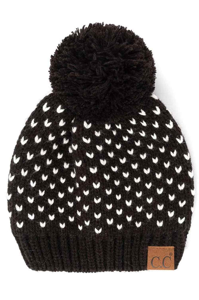 Black The C.C Heart Pattern Knit Pom Beanie features a charming heart design that adds a playful touch to your winter wardrobe. Crafted from soft, stretchy knit fabric with a cozy pom accent, it delivers warmth, comfort, and effortless seasonal style.