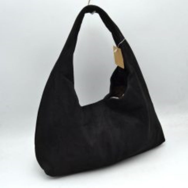 Black This slouchy hobo bag features a minimalist, seamless design with an integrated wide shoulder strap that rests comfortably on the shoulder for easy everyday use. The unstructured silhouette opens up to a spacious main compartment accessible via a top zipper closure to keep daily essentials secure. Offering a clean and classic aesthetic, this versatile bag provides a smooth finish that effortlessly complements any casual wardrobe.