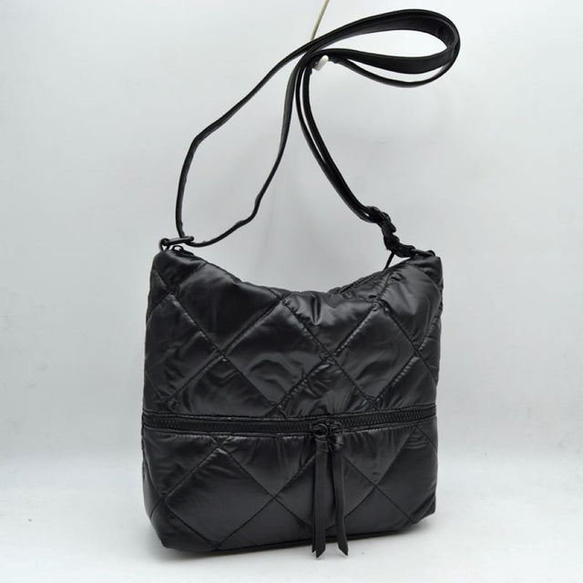Black Stay organized in style with this quilted crossbody shoulder bag designed for everyday convenience. Featuring a spacious main compartment and a practical front zip pocket, it offers ample room for carrying daily essentials while keeping frequently used items within easy reach. The adjustable shoulder strap provides comfortable wear throughout the day, making it suitable for work, travel, shopping, or casual outings.