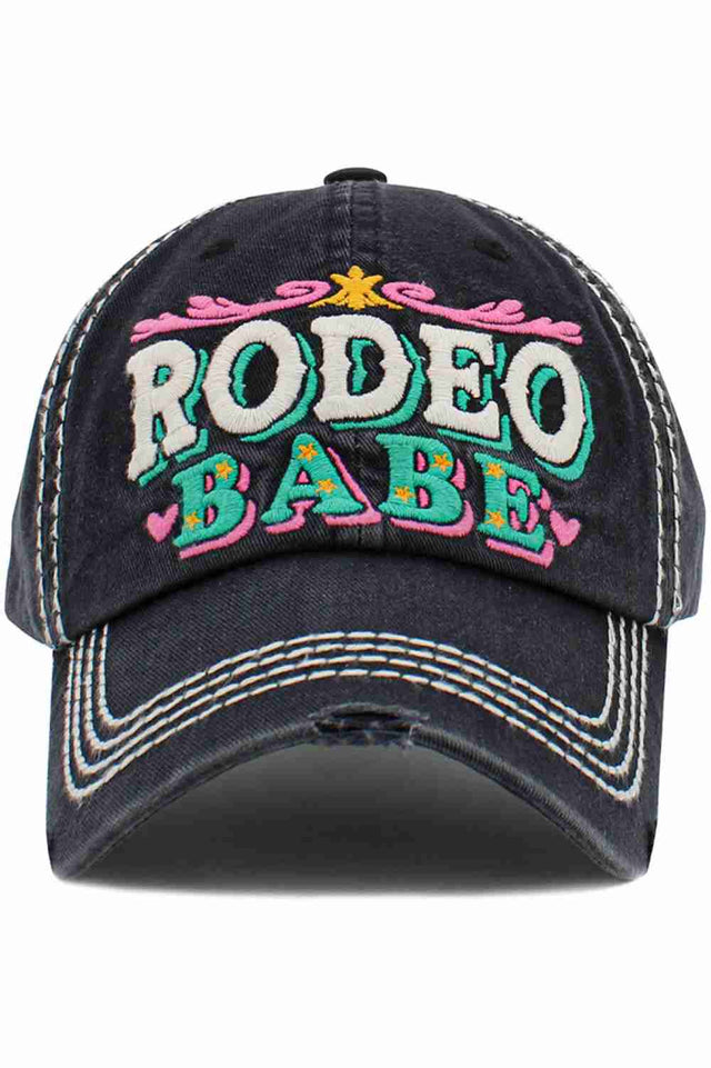 Black The RODEO BABE Vintage Ball Cap features a bold, western-inspired design with a classic vintage look. Comfortable and easy to wear, it’s perfect for everyday outfits, casual outings, and adding a touch of rodeo attitude to your style.