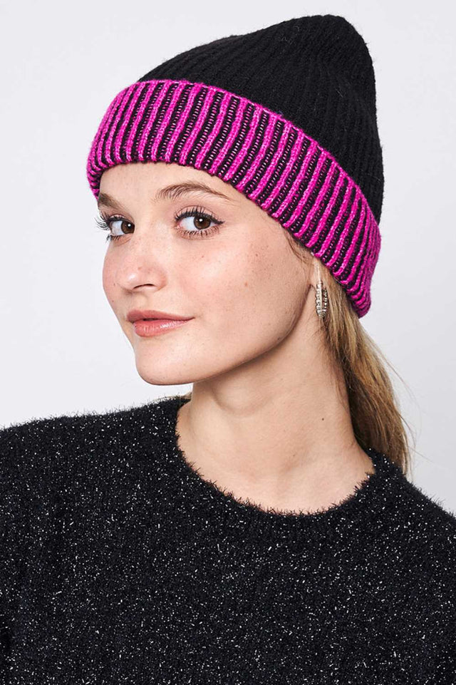 Black Two Tone Cuff Beanie features a stylish two-color knit design with a classic folded cuff for a modern winter look. Made with a soft stretch fit, it provides cozy warmth and all-day comfort while adding effortless style to your cold-weather outfits.