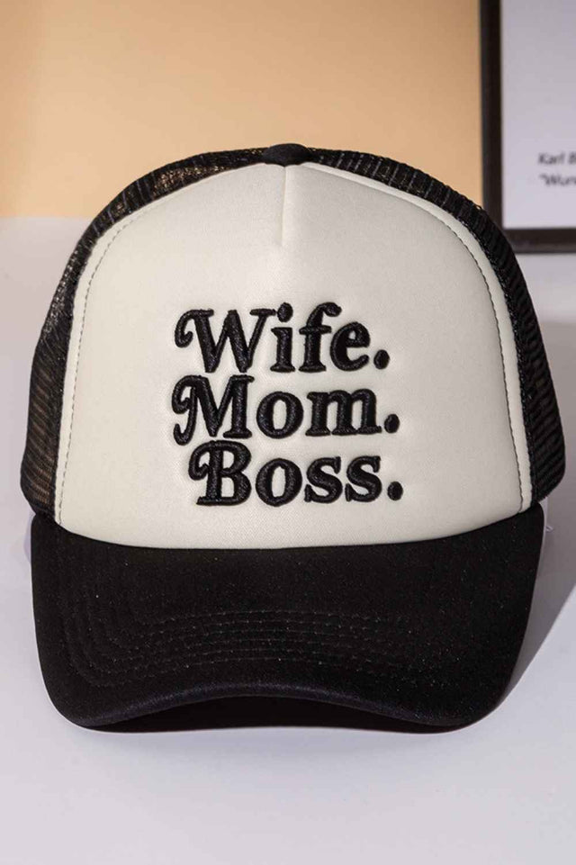 Black Perfect for the multitasking woman who does it all. This trucker cap features bold "WIFE MOM BOSS" lettering on a structured foam front with breathable mesh back paneling. The snapback closure ensures a comfortable, adjustable fit for any head size. Made from 100% polyester for durability and easy care. Whether you're heading to work, running errands, or just making a statement, this cap celebrates your hustle with style and attitude.