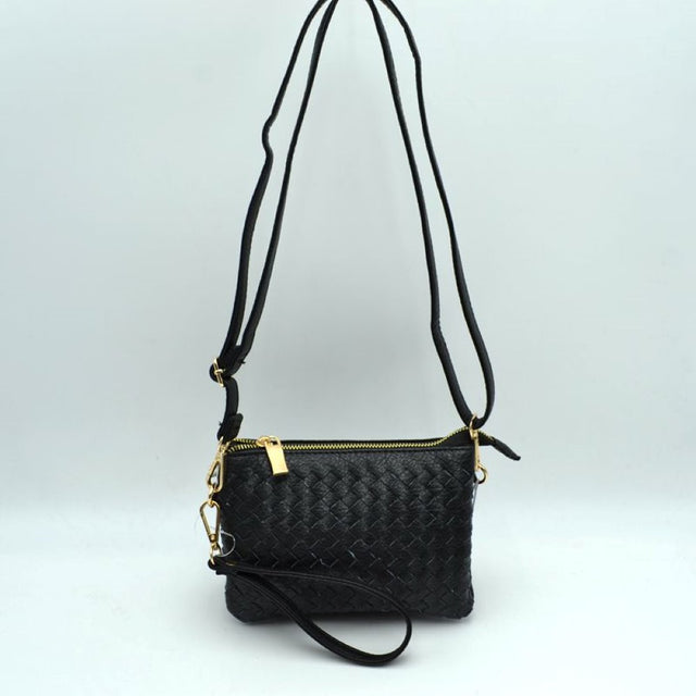 Black Meet your new go-to companion for hands-free convenience and effortless style. Combining a beautifully textured, woven exterior with exceptional organization, this versatile bag transitions perfectly from a casual daytime crossbody to a chic evening wristlet.