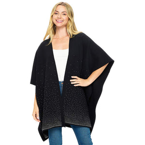 Black Clear Bling Solid Ruana Poncho is a fashionable outfit. Crafted with a soft, luxurious  blend of 50% viscose, 25% nylon, and 25% polyester, this poncho provides a superior level of comfort and warmth. The one size fits all construction adds to its versatility. An essential piece for your wardrobe for winter season.