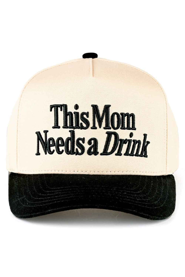 Black Stay cool and comfortable with the C.C This Mom Needs A Drink Two Tone Letter Embroidered Trucker Hat. Crafted from breathable 100% cotton, this classic baseball cap features eye-catching embroidered lettering and a stylish two-tone design. The adjustable snapback closure provides a perfect fit for most, with a 22.5" circumference. Whether you're running errands, enjoying outdoor activities, or just keeping it casual, this versatile cap adds personality to any outfit. Quality made in Vietnam, it'