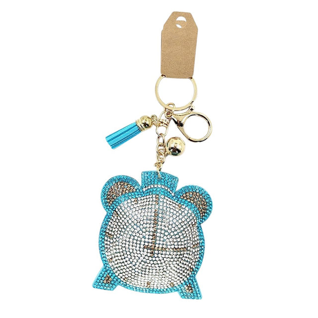 Aqua Bling Clock Tassel Bag Charm is the perfect accessory for any handbag, adding a touch of sophistication and style. Made with high-quality materials, this charm features a sparkling bling clock that adds a touch of elegance to any outfit. The attached tassel creates movement and visual interest, making it both fashionable and functional. Elevate your bag with this must-have accessory.