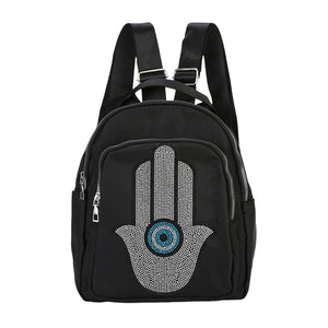 Bling Evil Eye Hamsa Hand Pointed Backpack, This backpack features a dazzling design with an Evil Eye Hamsa Hand Pointed design. Perfect for carrying your belongings in style, while also adding a touch of protection with the powerful Evil Eye and Hamsa symbols. Perfect gift for your religious loved ones.