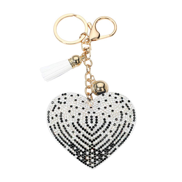 Black Bling Heart Tassel Bag Charm is a stylish and eye-catching accessory that will add a touch of sparkle to any bag. With its bling heart design and tassel detail, it is perfect for the fashion-forward individual. Made with high-quality materials, it is both durable and fashionable.