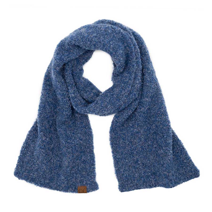 Blue C.C Mixed Color Boucle Scarf, is crafted from a luxurious blend of soft acrylic and wool materials. A fashionable accessory for any wardrobe, Its stylish looped texture features multicolored accents, providing a unique and eye-catching look. The scarf's lightweight design ensures comfort and warmth all season long.
