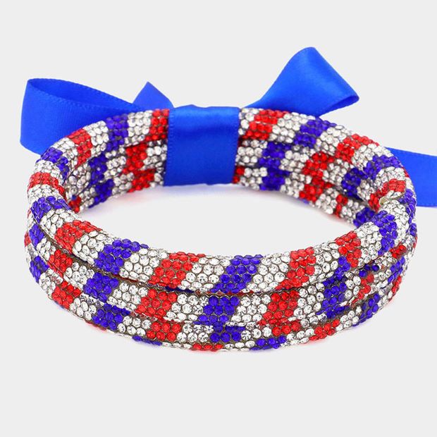Blue, Clear, Red Elegant stretch bracelet featuring sparkling crystals in a striking design. Perfect accessory for adding glamour to any outfit, ideal for parties, holidays, and special occasions.