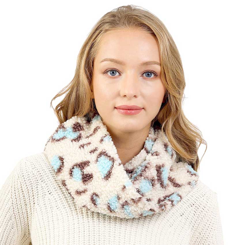 Blue Colorful Leopard Pattern Teddy Bear Infinity Scarf, is made from soft and lightweight fabric, making it perfect for keeping warm and stylish. The colorful leopard pattern design adds a touch of fun and style to any outfit. The generous size makes it versatile for multiple looks.