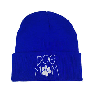 Blue Dog Mom Message Paw Pointed Solid Knit Beanie Hat, This adorable accessory not only keeps you warm but also proudly displays your status as a devoted dog mom. It's the perfect gift for the dog lover in your life, making chilly days a little brighter and a lot more fashionable.