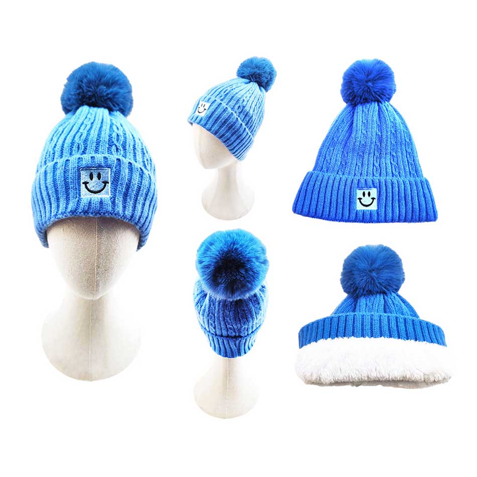 Blue Fleece Lining Smile Pointed Pom Pom Beanie Hat, Stay warm and stylish with this hat. Wear it on a cold winter day or as a fashion statement. Perfect for chilly winter days. Warming gift item for teenagers, fashion enthusiasts, co-workers, friends & family members, and yourself.