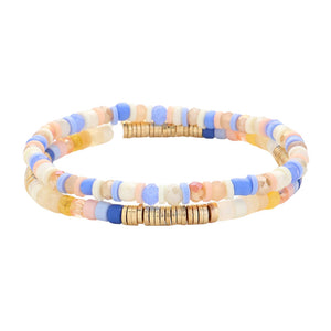 Blue Multi 2PCS - Heishi Beaded Stretch Multi Layered Bracelets, Upgrade your bracelet game with these. This set includes two bracelets that are made with high-quality Heishi beads and stretchy elastic for a comfortable fit. The layered design adds a stylish touch to any outfit. Perfect for adding a pop of color to your look.