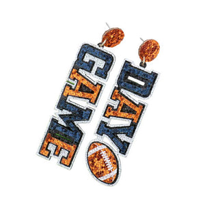 Blue Orange Game Day Message Football Bling Dangle Earrings, feature a sparkling crystal football and message charms with a metallic finish. Show your team spirit with these whimsical earrings. The perfect accessory for the biggest game days and the perfect gift for sports lovers. 