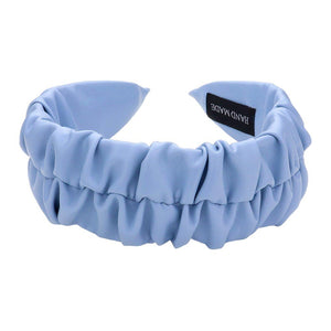 Blue Pleated Solid Faux Leather Headband, This stylish accessory adds an elegant touch to any outfit. Made with high-quality materials, it is both comfortable and durable. The pleated design offers a unique, sophisticated look, while the faux leather adds a touch of luxury. Perfect for any formal or casual occasion wear.