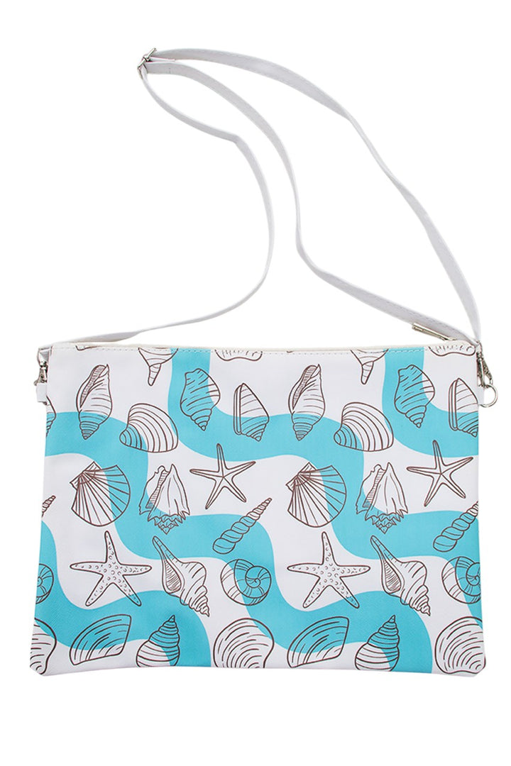 Under The Sea Cross Body Bag combines practical design with a marine-inspired aesthetic. Crafted for hands-free convenience, it offers secure storage with easy access, making it ideal for daily use or travel. Its compact size and adjustable strap ensure comfort and versatility, while the durable materials provide lasting wear. Perfect for those who appreciate functional style with a subtle nod to oceanic themes. 