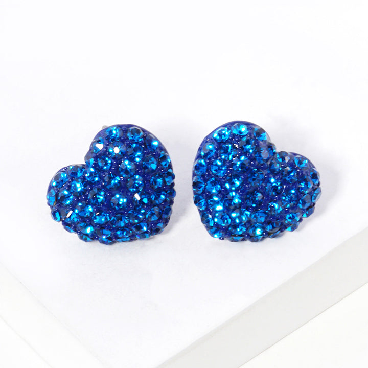 Blue Crystal Pave Heart Stud Earrings bring a stylish and sophisticated touch to any outfit. Featuring a sparkling crystal pave design, these earrings add elegance to your look. Crafted with high-quality materials, they are perfect for any occasion. 