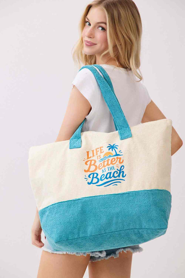 Blue Carry your beach essentials in style with this spacious terry tote bag. Featuring a bold "LIFE IS BETTER AT THE BEACH" letter design, it's the perfect companion for days by the water. The durable polyester and polyamide blend resists wear and tear, while the generous 22" x 16" x 6" dimensions accommodate everything you need. Secure zipper closure keeps your belongings safe, and an inner pocket provides convenient organization. Whether heading to the shore or running errands around town, this versatile 