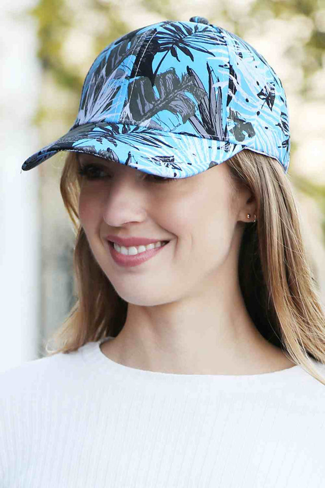Blue The Leaves Print Baseball Cap features a stylish all-over leaf pattern that adds a fresh, nature-inspired touch to any casual outfit. Made from lightweight, breathable fabric with an adjustable strap, it offers comfortable all-day wear and a secure fit.