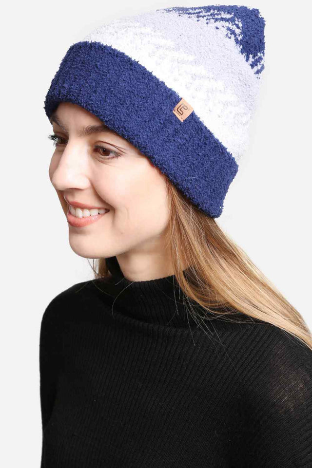 Blue The Mixed Knit Beanie features a textured blend of knit patterns that adds depth and style to your cold-weather look. Crafted from soft, stretchy fabric, it offers a comfortable fit and reliable warmth for everyday winter wear.