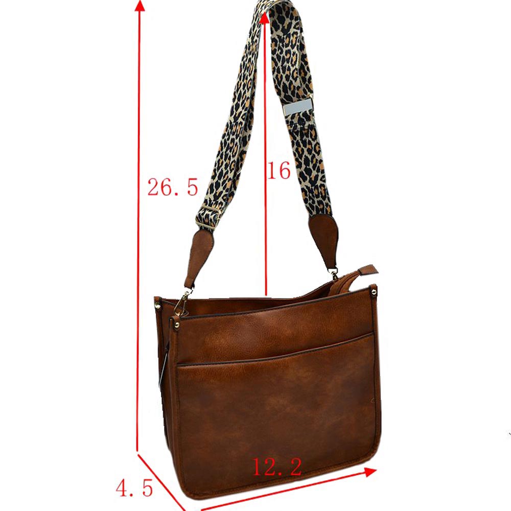 Brown Be ready for your next show or outing with this stylish leopard-patterned guitar strap cross-body shoulder bag. This bag offers great convenience and comfortable wearability. With adjustable straps, a zipper closure, and a stylish leopard pattern, this is the perfect bag for those who want style and function. 