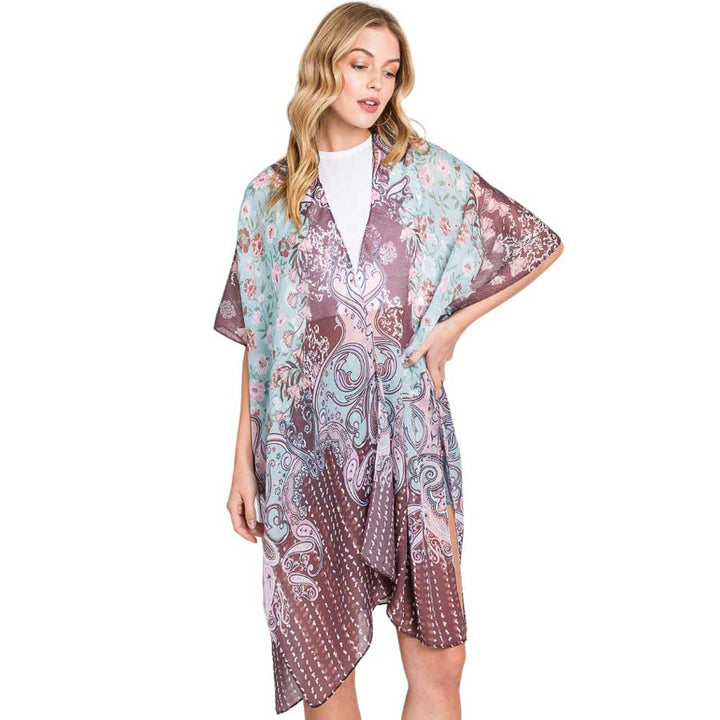 Brown Abstract Paisley Flower Print Kimono Poncho, Expertly crafted with an abstract paisley print, this kimono poncho is a versatile addition to any wardrobe. Made with lightweight, breathable material, it's perfect for layering over any outfit for a chic look. Enjoy the unique design and comfortable fit of this piece.