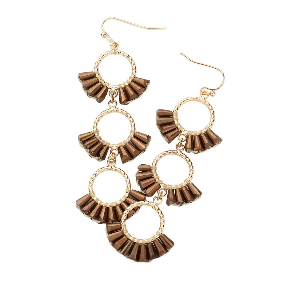 Brown Beaded Triple Hoop Dropdown Dangle Earrings, are an eye-catching accessory. With three interlocking rings, each beaded with vibrant colors, this earring set provides a perfect accent to any outfit. Lightweight and fashionable, these earrings can be dressed up or down, making them suitable for any occasion.