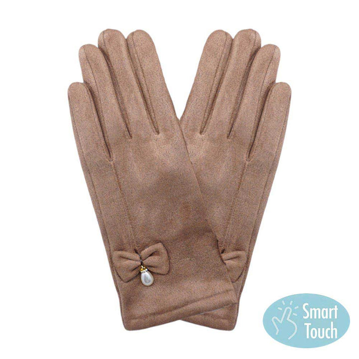 Brown Bow Pearl Dangle Pointed Faux Suede Smart Touch Gloves, these smart gloves designed for both stylish and practical use. With a smart touch feature, these gloves allow easy use of touchscreen devices. The faux suede material keeps your hands warm and comfortable, while the bow and pearl dangle add a touch of elegance.