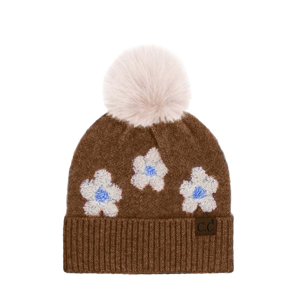 Brown C.C Daisy Pattern Beanie with Pom, stay warm and fashionable in this cozy, stylish beanie with pom. It's soft and warm and made from yarn for superior comfort. The playful pom accent adds a delightful touch of fun to any outfit. Awesome winter gift accessory for birthdays, Christmas, anniversaries, and family.