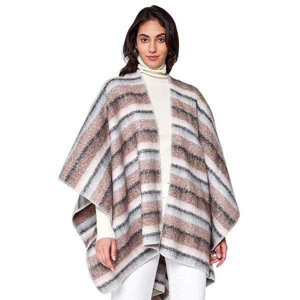 Brown Cozy Striped Three Tone Ruana Poncho, is made with a blend of soft, durable materials for maximum warmth and comfort. The unique three-tone striped pattern is both fashionable and eye-catching. A thoughtful gift for fashion-loving friends and family members, special ones, and colleagues this winter.