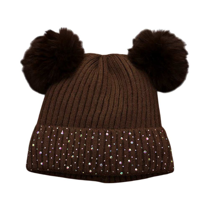 Brown Double Pom Pom Bling Studded Cuff Beanie Hat, stay warm and stylish with our beanie hat. This hat features two pom poms, studded accents, and a cozy cuff.