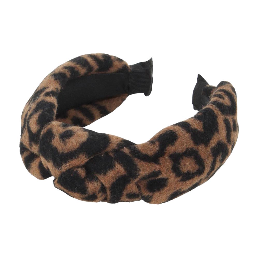 Brown Stay up to date with the latest trends with this Leopard Patterned Knot Burnout Headband. Made from quality fabric, 50% Polyester, and 50% Plastic This combination creates a  comfortable fit, timeless leopard print ensures you look fashionable whatever the occasion. This eye-catching headband will spice up your look.