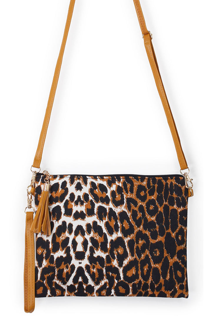 Leopard Print Crossbody Clutch Bag combines bold style with practical design. Featuring a distinctive leopard pattern, it adds a fashionable edge to any outfit. The crossbody strap offers hands-free convenience, while its compact size is perfect for carrying essentials securely. Crafted with attention to detail, this clutch balances durability and elegance, making it a smart choice for both casual and evening occasions. 
