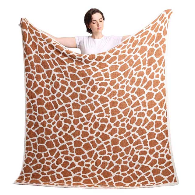 Brown Reversible Giraffe Patterned Throw Blanket, Featuring a reversible design of beautiful giraffe patterns, this throw blanket will instantly add a pop of color to any room. Winters will be kept cozy with the microfiber material that ensures warmth without sacrificing comfort. This can be a nice gift in the cold ace.