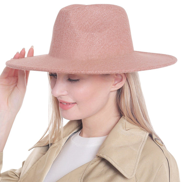 Brown Solid Panama Hat is a stylish and timeless accessory that adds sophistication to any outfit. Made from high-quality materials, this hat offers both comfort and durability. Its classic design is perfect for any occasion and its versatility makes it a must-have for any fashion-forward individual.