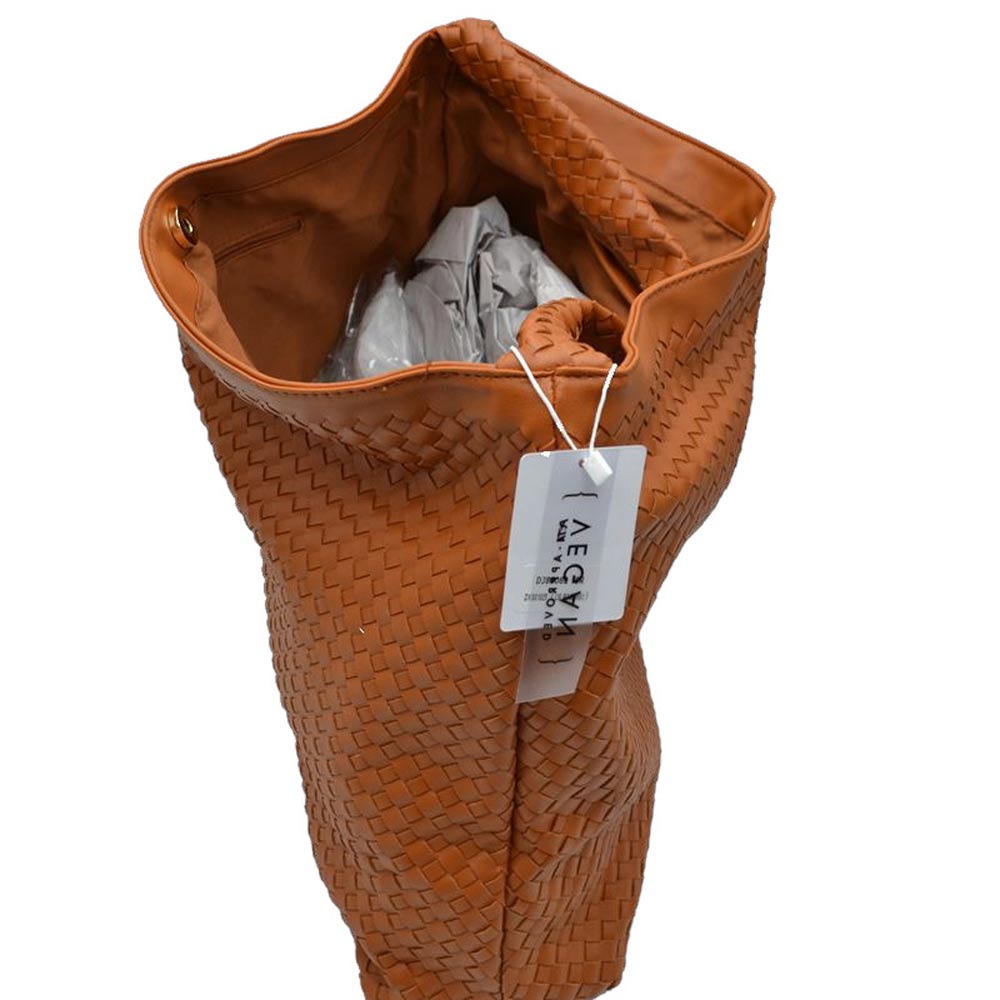 Brown Top Handle Woven Patterned Tote Bag, is a stylish and comfortable way to carry all your daily necessities. Featuring top handles, it's perfect for carrying over the shoulder, and its woven design ensures that it stands out from other handbags.  This tote bag is a practical and fashionable choice For the summer.