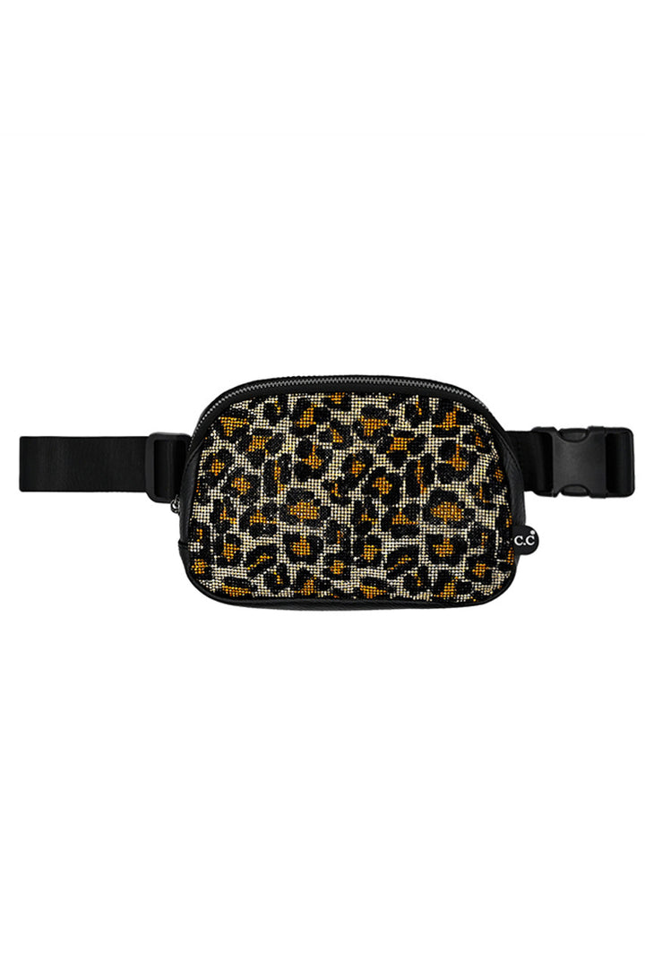 Brown Leo C.C Animal Print Rhinestone Crossbody Fanny Pack combines fashion and functionality with its trendy animal print design and versatile crossbody or fanny pack wear options. Featuring rhinestone accents, this pack is not only stylish, but also adds a touch of glamour to any outfit. Stay hands-free and stylish on-the-go with this must-have accessory.