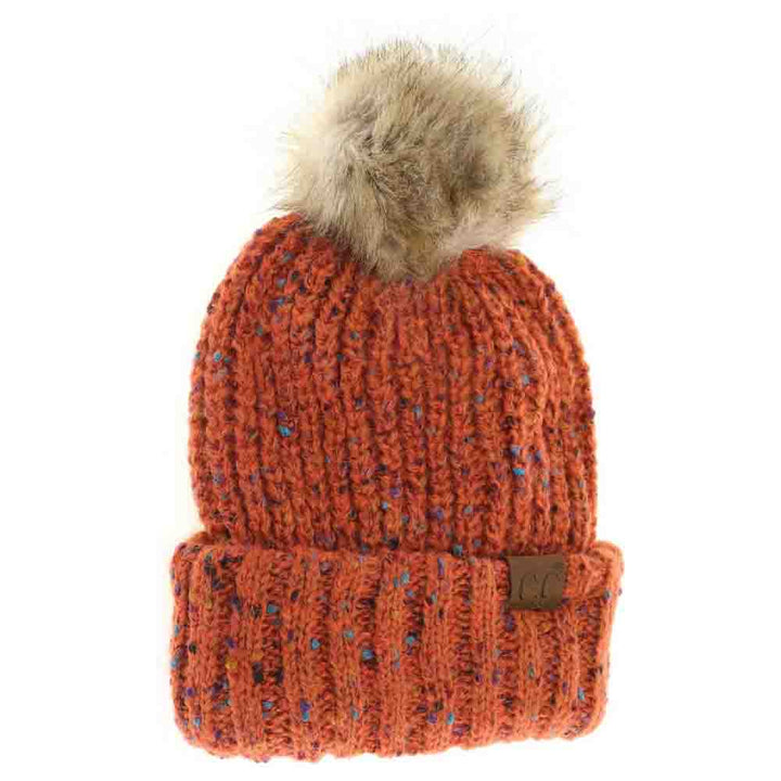 Brunt-Orange- Confetti Mohair Ribbed Fur Pom C.C Beanie combines cozy warmth with stylish texture. Crafted with a soft mohair blend, its ribbed design offers a comfortable, snug fit that retains heat. Topped with a luxurious fur pom, this beanie adds a sophisticated touch to any cold-weather outfit while ensuring superior comfort and durability. Ideal for both casual and refined winter wear.