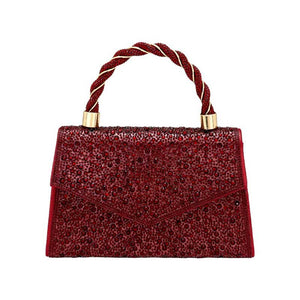 Burgundy Bling Top Handle Evening Crossbody Bag, is the perfect accessory to complete any outfit. The durable construction and fashionable design of this bag make it ideal for special occasions. With enough space for a cell phone, lipstick, and other essential items, you'll never be without the perfect accessory.