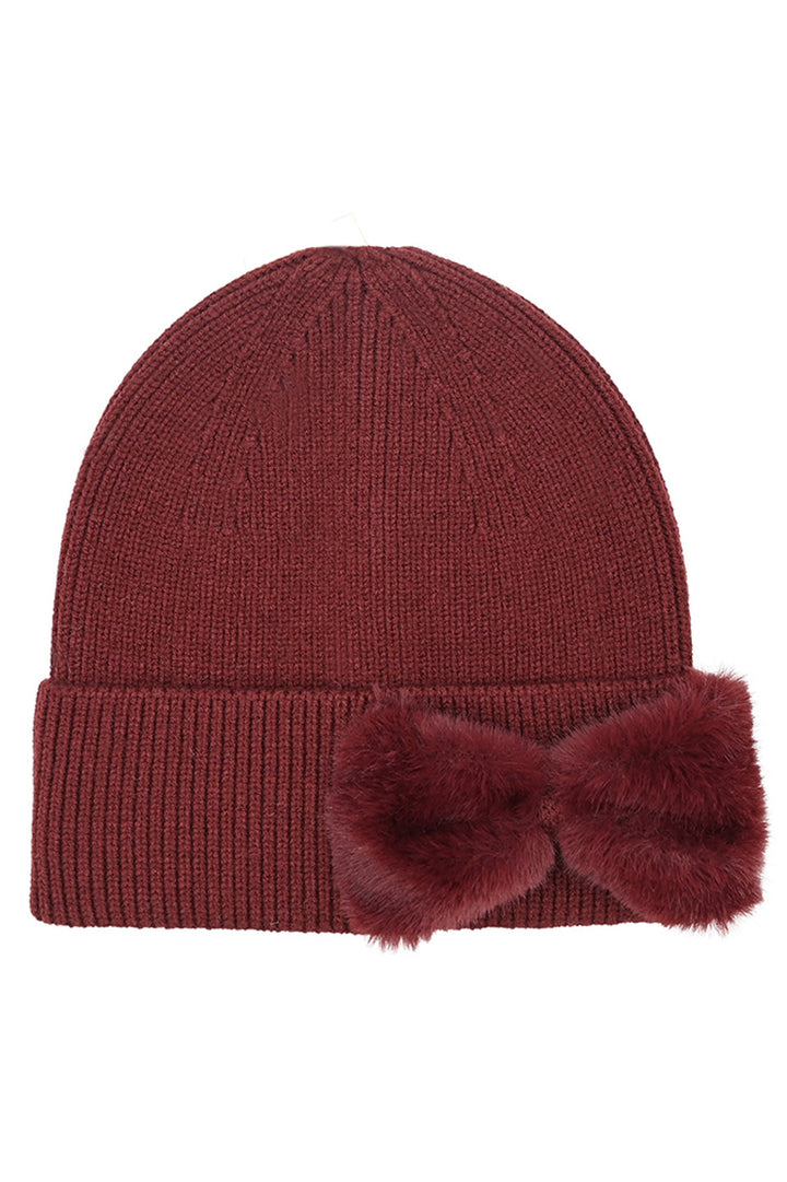 Burgundy C.C Faux Fur Solid Bow Beanie Winter Hat merges thermal protection with refined aesthetics. Crafted with premium faux fur for exceptional insulation, this headwear features a distinctive bow accent that elevates its design profile. Engineered for consistent warmth retention while maintaining breathability, it represents the optimal balance of functional performance 