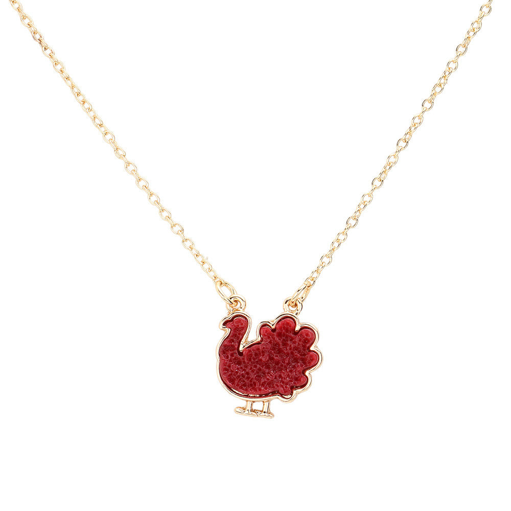 Burgundy Druzy Turkey Pendant Necklace, is beautifully designed with an animal theme that will make a glowing touch on everyone. This beautiful necklace is the ultimate representation of your class & beauty. Perfect gift accessory for especially Thanksgiving to your friends, family, and the persons you love and care about.