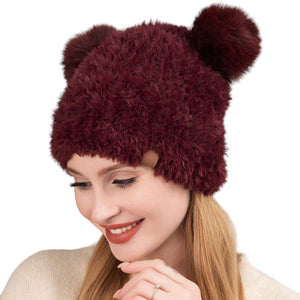 Burgundy Faux Fur Pom Pom Ear Beanie Hat, stay warm in style with this comfy beanie hat. Crafted with high-quality faux fur, this piece offers maximum insulation and a fashionable look. This is the perfect hat for any stylish outfit or winter dress. Perfect gift for Birthdays, Christmas, holidays etc. to your friends, family.