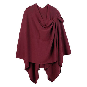 Burgundy Shoulder Strap Solid Ruana Poncho, with the latest trend in ladies outfit cover-up! the high-quality bling border solid neck poncho is soft, comfortable, and warm but lightweight. Stay protected from the chilly weather while taking your elegant looks to a whole new level with an eye-catching, luxurious outfit women!