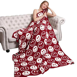 Burgundy Smile Patterned Reversible Throw Blanket, this ultra-soft throw provides warmth and comfort to any living space. It's made from high-quality materials and features a reversible design featuring a fun, cheerful smile pattern that adds a touch of personality to your home. Perfect winter gift for family and friends.