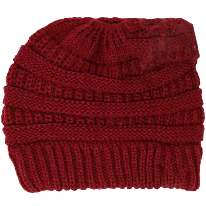 Burgundy Solid Classic CC Beanie Tail combines timeless style with functional warmth. Crafted from soft, durable fabric, this beanie offers reliable comfort during colder months. Its classic design ensures versatile wear, while the extended tail detail adds a unique twist, making it an excellent choice for stylishly protecting your head and ears from chill. Perfect for everyday use, it pairs seamlessly with various outfits to keep you cozy in expert fashion. 