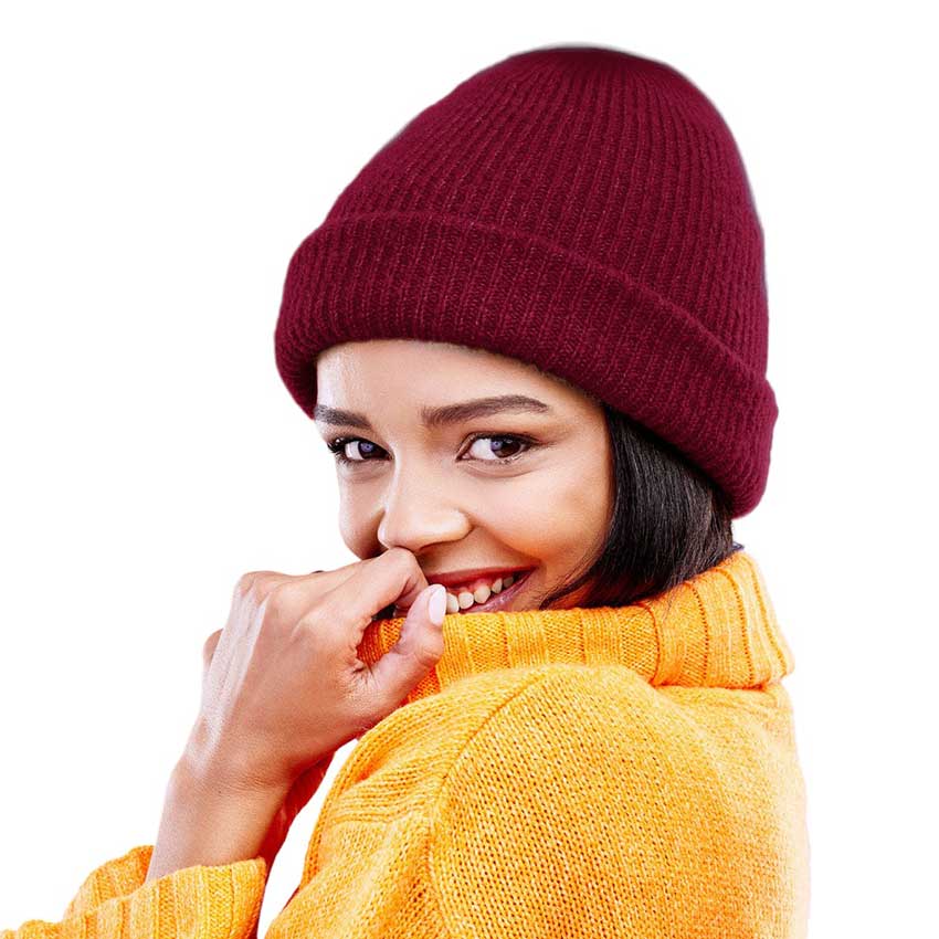 Burgundy Solid Knit Beanie Hat, stay warm no matter the weather with this. Crafted from thick, soft knit for superior comfort and insulation, this stylish beanie is perfect for outdoor activities. The lightweight design ensures maximum breathability, making it an ideal choice for long-term wear or making an ideal winter gift.