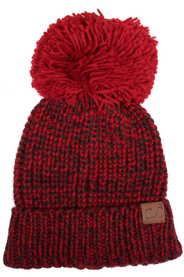 Burgundy Elevate your winter wardrobe with the C.C Dual Color Knit Beanie featuring a charming pom-pom accent. Crafted from 100% soft acrylic, this two-tone design combines comfort with contemporary style. The versatile knit construction provides warmth without excess bulk, making it ideal for layering under hoods or wearing solo. The playful pom-pom adds a touch of personality to any cold-weather look. One size fits most for effortless, all-season wear that transitions seamlessly from casual outings to out