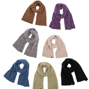 C.C Mixed Color Boucle Scarf, is crafted from a luxurious blend of soft acrylic and wool materials. A fashionable accessory for any wardrobe, Its stylish looped texture features multicolored accents, providing a unique and eye-catching look. The scarf's lightweight design ensures comfort and warmth all season long.